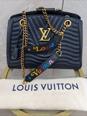 Louis Vuitton Black Quilted Shoulder Bag with Gold Accents